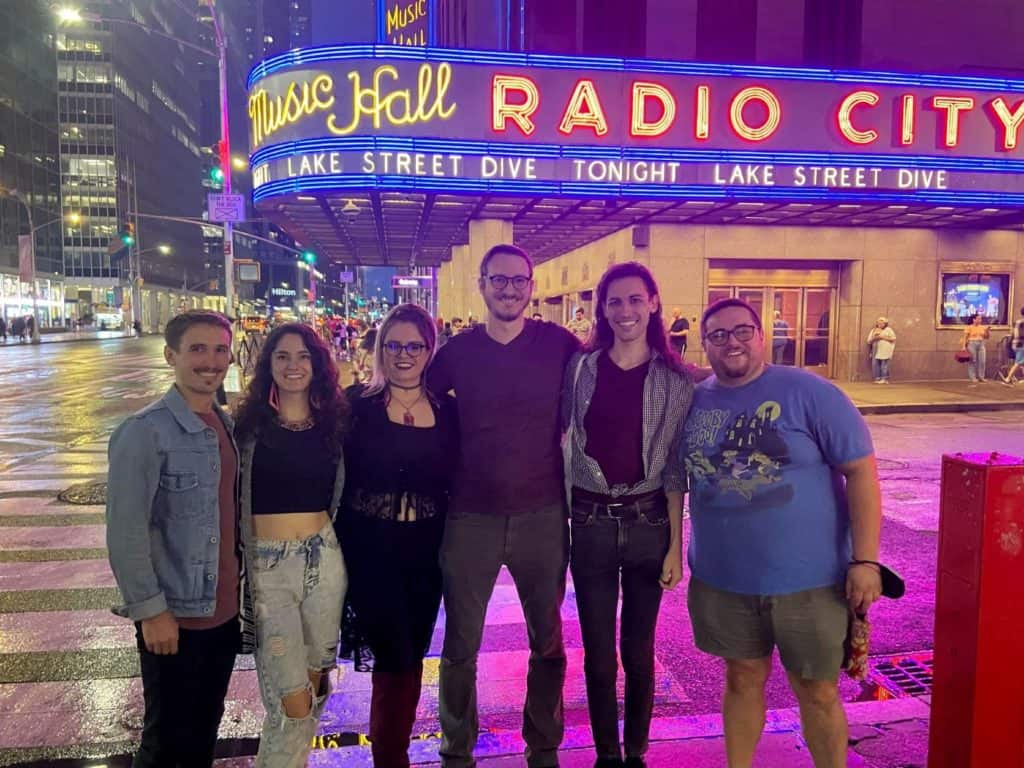 A group of friends in front of Radio City Music Hall in New York City in October.