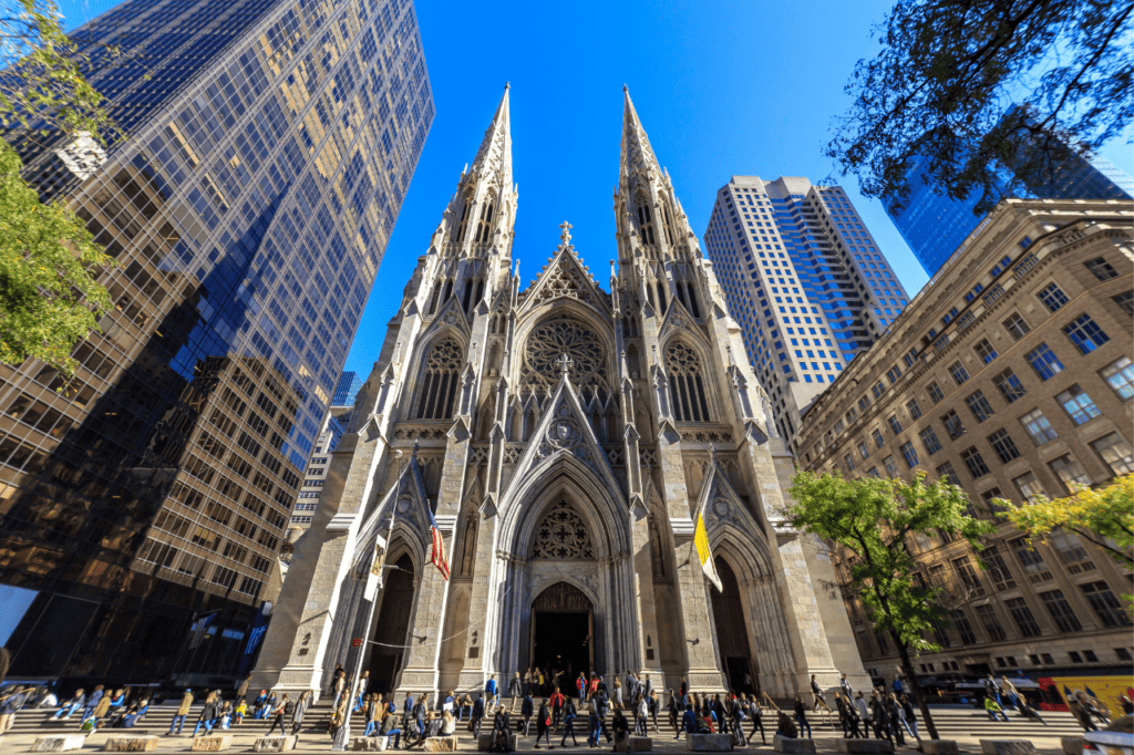 A gothic cathedrial in a city.