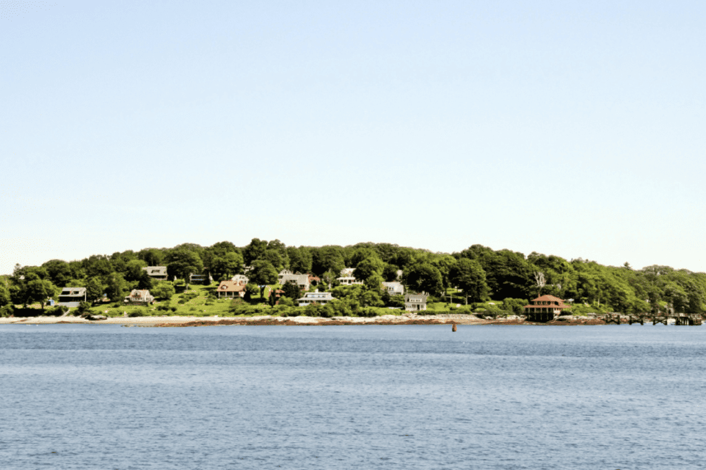 A view of an island from the ocean.