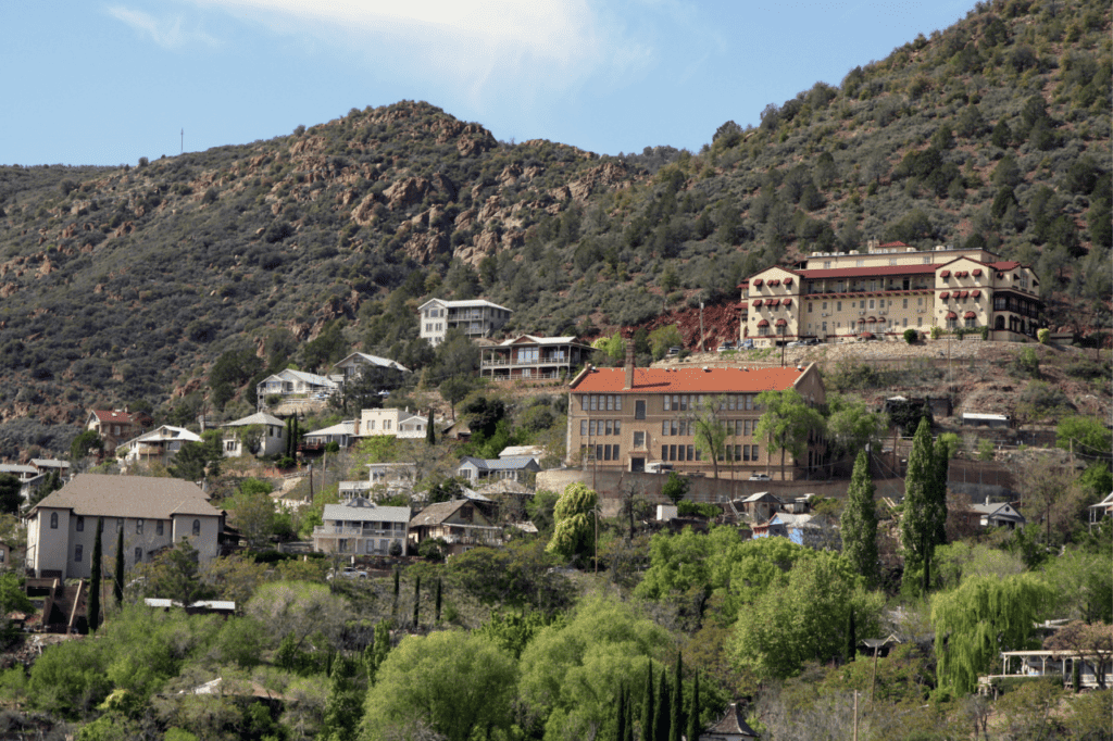 A small western town built on the side of a mountain.