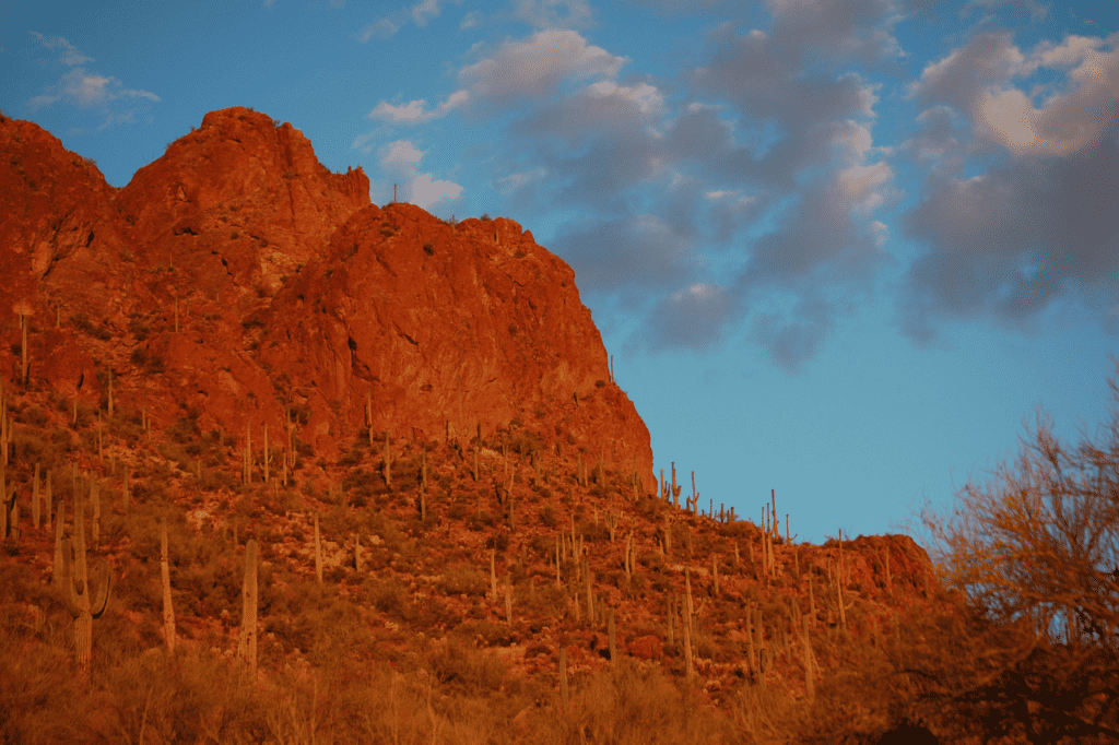 A mountain bathed in evening light during the sunset