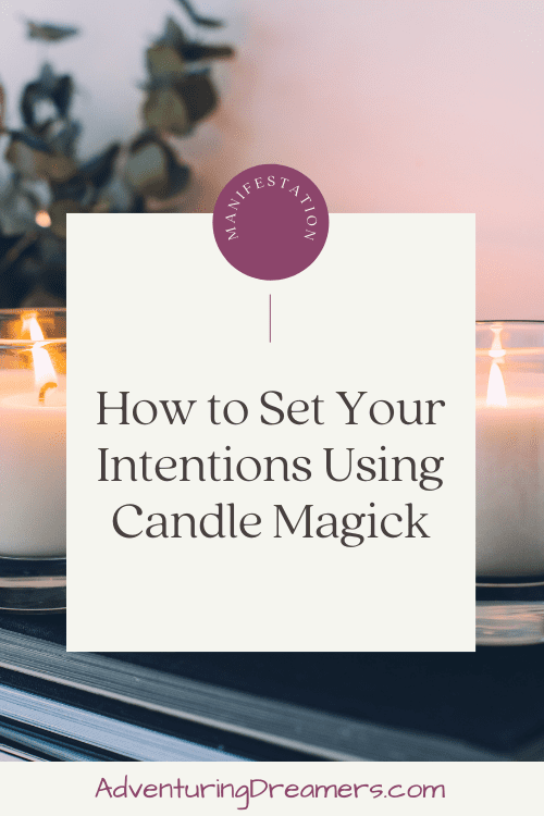 A Pinterest pin with candles in the background in a well lit room. Text reads, "Manifestation. How to set your intentions using candle magick. Adventuringdreamers.com"