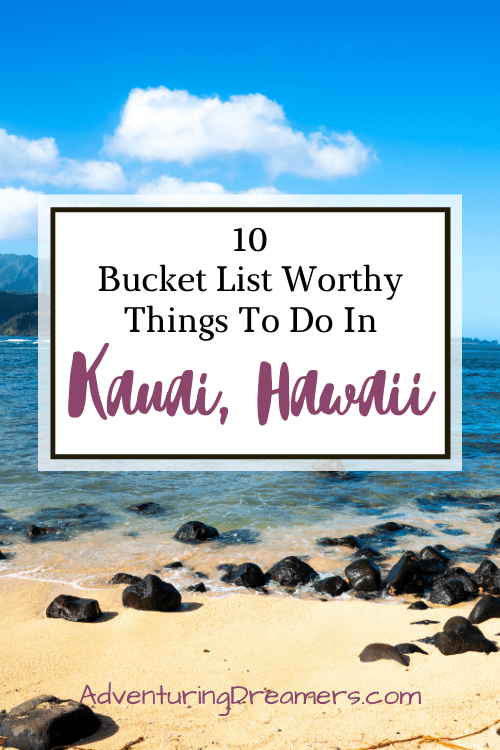 Igneous rocks are scattered across a sandy beach. A text box reads "10 Bucket List Worthy Things to do in Kauai, Hawaii."