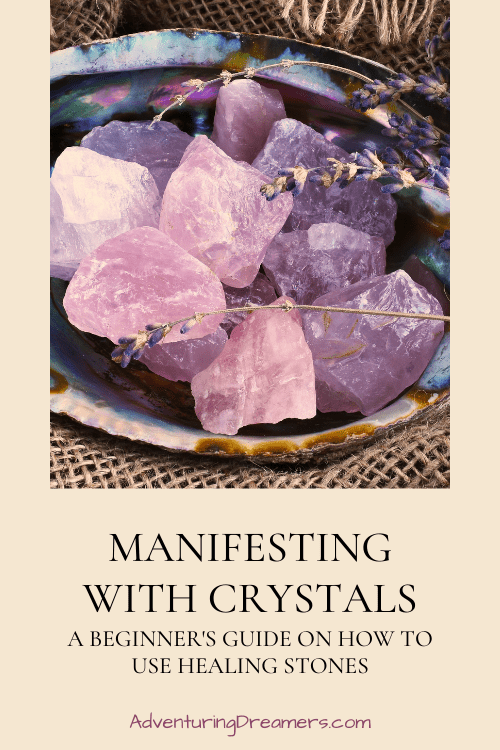A bowl of rose quartz with text printed underneath that reads, "Manifesting with crystals: A beginner's guide on how to use healing stones. Adventuringdreamers.com"