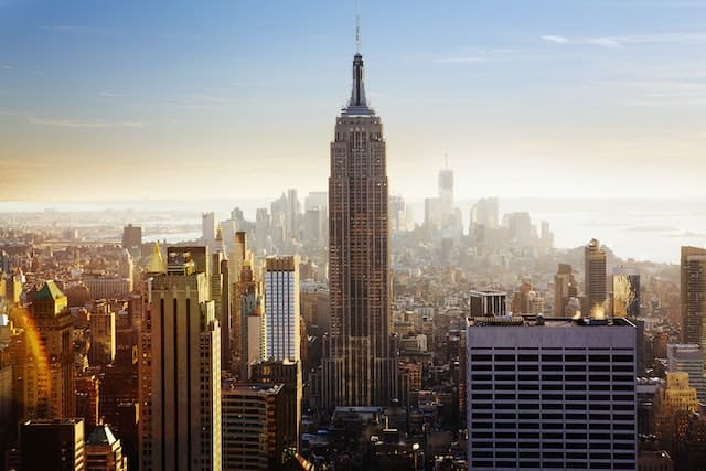 A tall building in the center of a concrete jungle - which New York City pass is best to see the Empire state building?