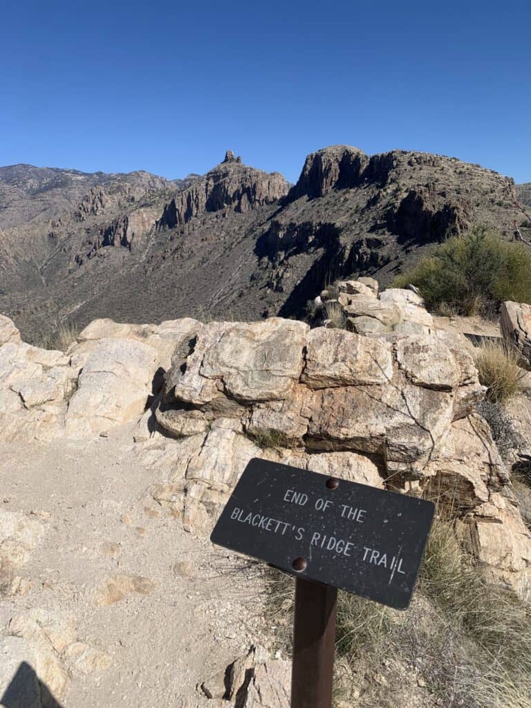 A sign reads: "End of the Blackett's Ridge Trail." Blacketts Ridge, one of the best peak hikes near Tucson.