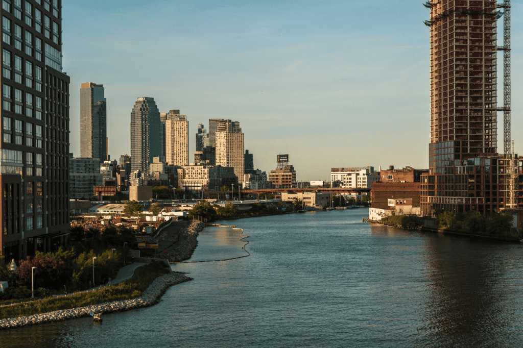 A city scape next to a river